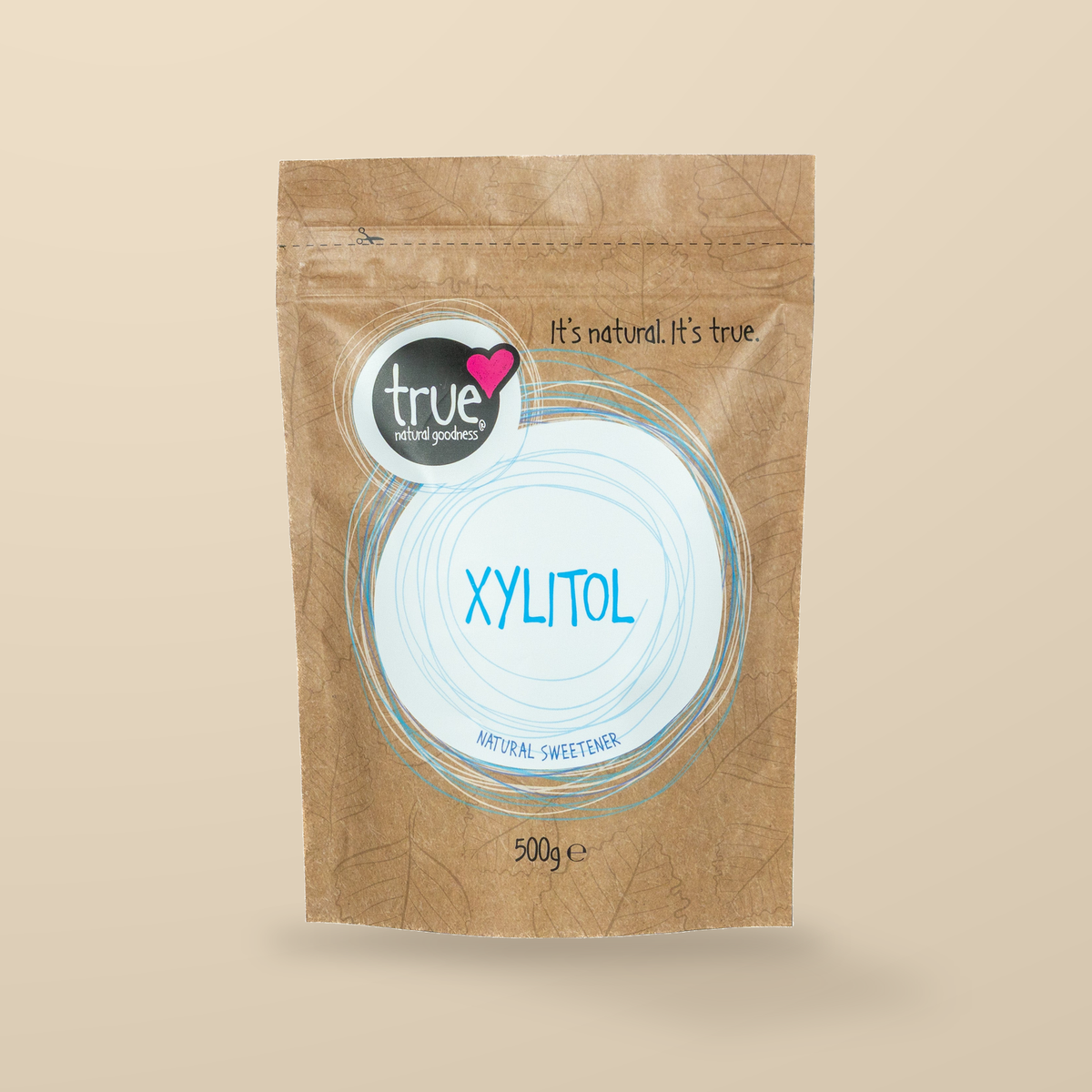 True Natural Goodness Xylitol – 500g — original product packaging on warm beige background