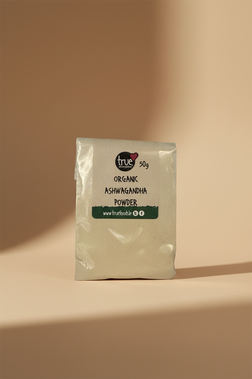 A 50g packet of True Organic Ashwagandha Powder, showing the beige powder through a clear plastic bag with a black and green label.