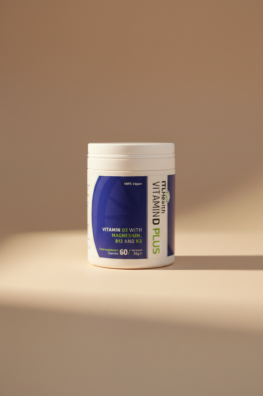A hand holding a white plastic tub of ITI Health Vitamin D Plus food supplement capsules. The label features a dark blue and white design with green and yellow text.