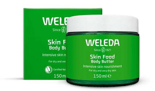 Weleda Skin Food Body Butter 150ml in eco-friendly glass jar with whipped texture.