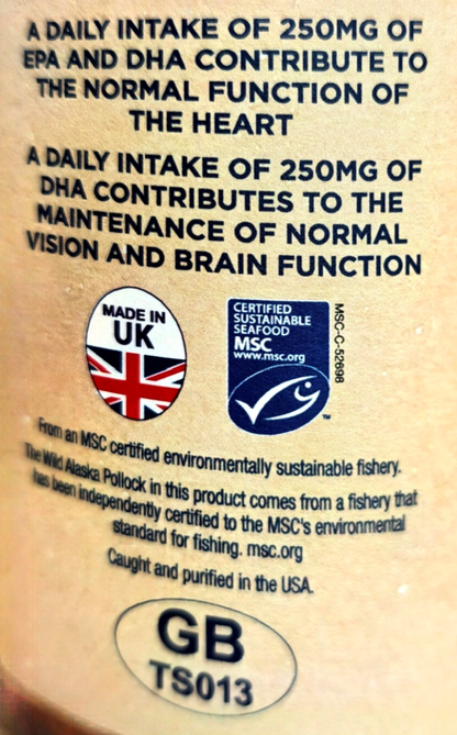 Close-up of a beige food package label with black text about daily EPA and DHA intake, plus a UK Made in UK badge, an MSC certified sustainable seafood logo, and a GB TS013 mark.